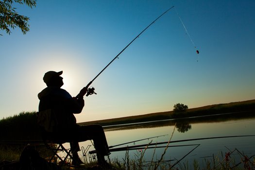 man fishing lake