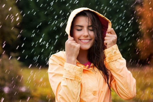 Natural female beauty in autumn rain