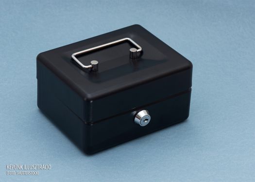 Closed black money box on the blue background.