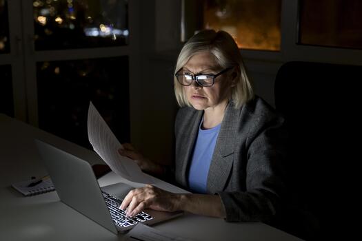 woman working late office