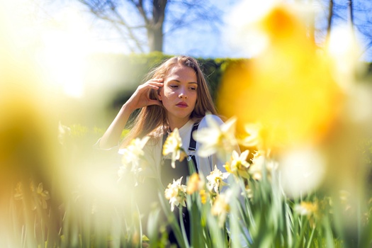 young blonde caucasian female posing camera sunlight city pamplona