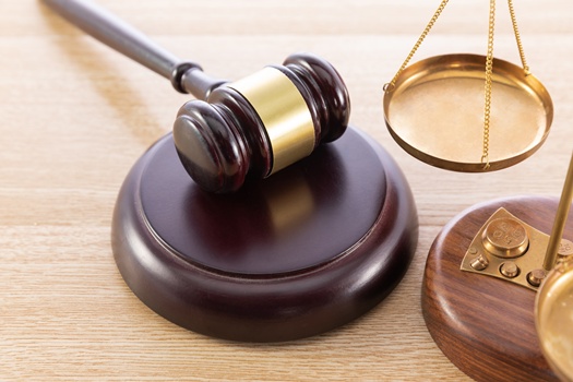 high angle shot gavel scale wooden surface